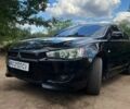 Черный Мицубиси Лансер, объемом двигателя 2 л и пробегом 240 тыс. км за 5500 $, фото 1 на Automoto.ua