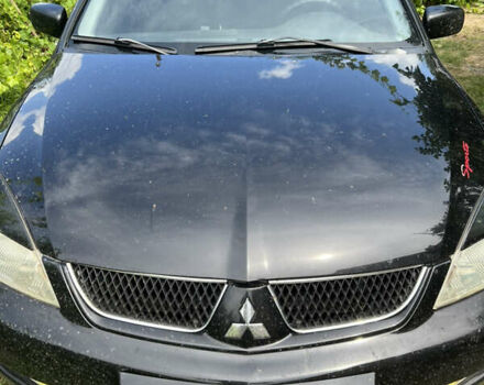 Мицубиси Лансер 2007 в Славянске на Automoto.ua Черный Мицубиси Лансер, объемом двигателя 1.6 л и пробегом 190 тыс. км за 2000 $, фото 5 на Automoto.ua