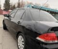 Черный Мицубиси Лансер, объемом двигателя 0 л и пробегом 240 тыс. км за 3300 $, фото 2 на Automoto.ua