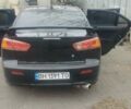 Черный Мицубиси Лансер, объемом двигателя 2 л и пробегом 222 тыс. км за 6300 $, фото 4 на Automoto.ua