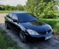 Чорний Міцубісі Lancer, об'ємом двигуна 1.6 л та пробігом 300 тис. км за 5300 $, фото 22 на Automoto.ua