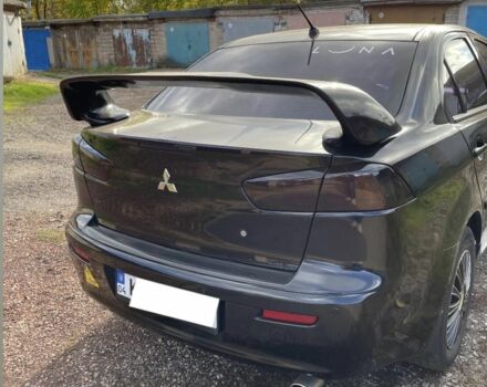 Мицубиси Лансер 2007 в Кривом Роге на Automoto.ua Черный Мицубиси Лансер, объемом двигателя 1.5 л и пробегом 150 тыс. км за 6500 $, фото 4 на Automoto.ua