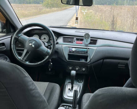 Чорний Міцубісі Lancer, об'ємом двигуна 1.6 л та пробігом 212 тис. км за 4700 $, фото 9 на Automoto.ua
