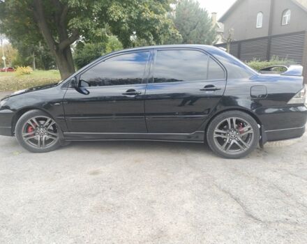 Міцубісі Lancer 2007 у Кам'янське (Дніпродзержинськ) на Automoto.ua Чорний Міцубісі Lancer, об'ємом двигуна 2 л та пробігом 268 тис. км за 5999 $, фото 2 на Automoto.ua