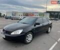 Чорний Міцубісі Lancer, об'ємом двигуна 1.58 л та пробігом 300 тис. км за 2900 $, фото 1 на Automoto.ua