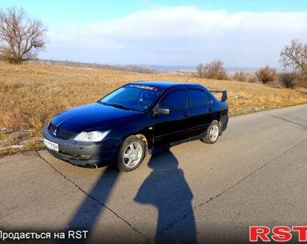 Черный Мицубиси Лансер, объемом двигателя 1.6 л и пробегом 300 тыс. км за 3700 $, фото 6 на Automoto.ua