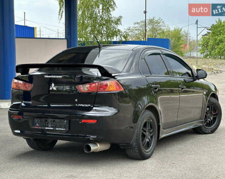 Чорний Міцубісі Lancer, об'ємом двигуна 2 л та пробігом 192 тис. км за 6500 $, фото 1 на Automoto.ua