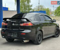 Чорний Міцубісі Lancer, об'ємом двигуна 2 л та пробігом 192 тис. км за 6500 $, фото 1 на Automoto.ua