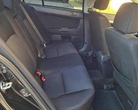 Мицубиси Лансер 2007 в Ужгороде на Automoto.ua Черный Мицубиси Лансер, объемом двигателя 2 л и пробегом 256 тыс. км за 7200 $, фото 2 на Automoto.ua