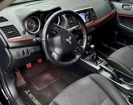 Черный Мицубиси Лансер, объемом двигателя 2 л и пробегом 164 тыс. км за 8300 $, фото 16 на Automoto.ua