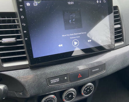 Чорний Міцубісі Lancer, об'ємом двигуна 2 л та пробігом 222 тис. км за 7500 $, фото 15 на Automoto.ua