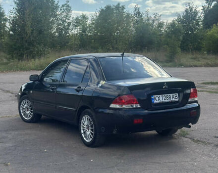 Мицубиси Лансер 2007 в Харькове на Automoto.ua Черный Мицубиси Лансер, объемом двигателя 1.58 л и пробегом 278 тыс. км за 3500 $, фото 3 на Automoto.ua