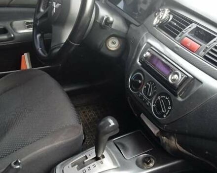 Черный Мицубиси Лансер, объемом двигателя 1.6 л и пробегом 223 тыс. км за 4300 $, фото 4 на Automoto.ua