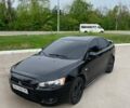 Чорний Міцубісі Lancer, об'ємом двигуна 2 л та пробігом 270 тис. км за 7000 $, фото 1 на Automoto.ua