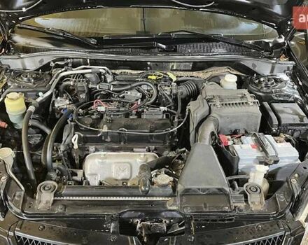 Черный Мицубиси Лансер, объемом двигателя 1.6 л и пробегом 249 тыс. км за 5000 $, фото 18 на Automoto.ua