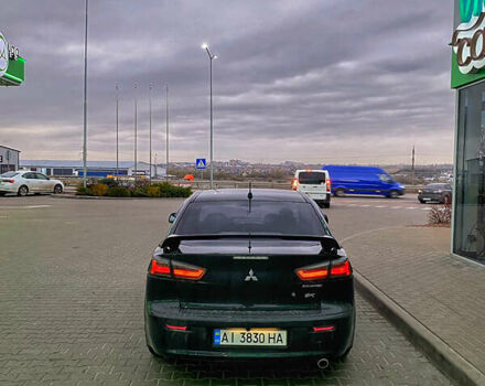 Черный Мицубиси Лансер, объемом двигателя 2 л и пробегом 164 тыс. км за 8300 $, фото 14 на Automoto.ua