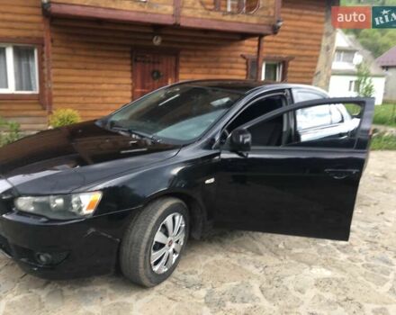 Черный Мицубиси Лансер, объемом двигателя 1.5 л и пробегом 240 тыс. км за 6900 $, фото 10 на Automoto.ua