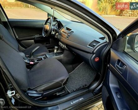 Чорний Міцубісі Lancer, об'ємом двигуна 2 л та пробігом 260 тис. км за 6555 $, фото 34 на Automoto.ua