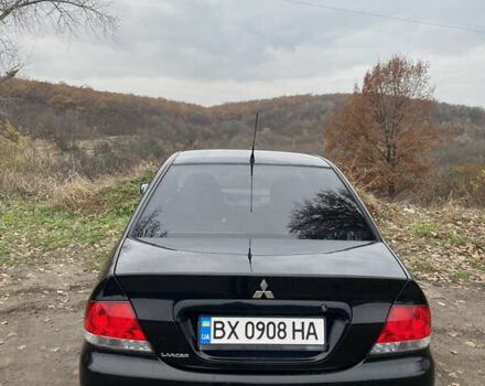 Черный Мицубиси Лансер, объемом двигателя 1.6 л и пробегом 171 тыс. км за 4700 $, фото 14 на Automoto.ua