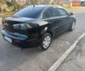 Чорний Міцубісі Lancer, об'ємом двигуна 1.5 л та пробігом 242 тис. км за 5550 $, фото 19 на Automoto.ua