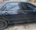 Черный Мицубиси Лансер, объемом двигателя 1.5 л и пробегом 320 тыс. км за 2000 $, фото 1 на Automoto.ua