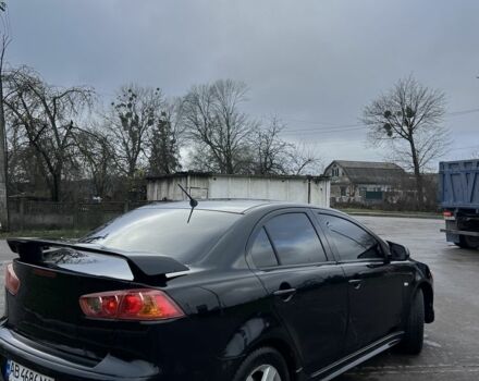 Черный Мицубиси Лансер, объемом двигателя 2 л и пробегом 350 тыс. км за 6700 $, фото 1 на Automoto.ua