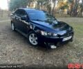 Чорний Міцубісі Lancer, об'ємом двигуна 2 л та пробігом 190 тис. км за 6800 $, фото 1 на Automoto.ua