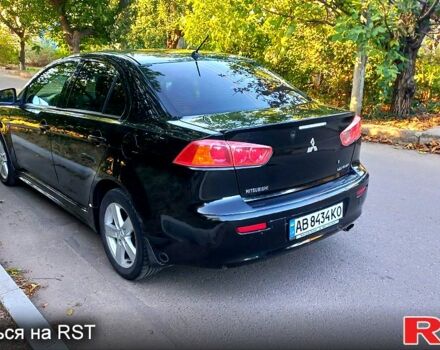 Черный Мицубиси Лансер, объемом двигателя 2 л и пробегом 290 тыс. км за 5800 $, фото 2 на Automoto.ua