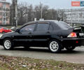 Чорний Міцубісі Lancer, об'ємом двигуна 1.6 л та пробігом 303 тис. км за 4350 $, фото 1 на Automoto.ua