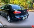 Черный Мицубиси Лансер, объемом двигателя 2 л и пробегом 290 тыс. км за 5800 $, фото 2 на Automoto.ua