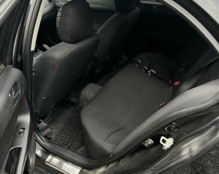 Черный Мицубиси Лансер, объемом двигателя 1.5 л и пробегом 300 тыс. км за 5800 $, фото 5 на Automoto.ua