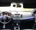 Черный Мицубиси Лансер, объемом двигателя 2 л и пробегом 280 тыс. км за 4600 $, фото 6 на Automoto.ua