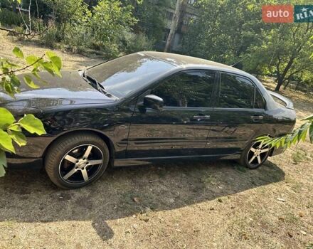 Мицубиси Лансер 2007 в Краматорске на Automoto.ua Черный Мицубиси Лансер, объемом двигателя 2 л и пробегом 193 тыс. км за 6250 $, фото 5 на Automoto.ua