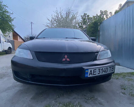 Чорний Міцубісі Lancer, об'ємом двигуна 1.6 л та пробігом 195 тис. км за 5200 $, фото 32 на Automoto.ua
