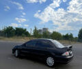 Черный Мицубиси Лансер, объемом двигателя 2 л и пробегом 250 тыс. км за 3850 $, фото 2 на Automoto.ua