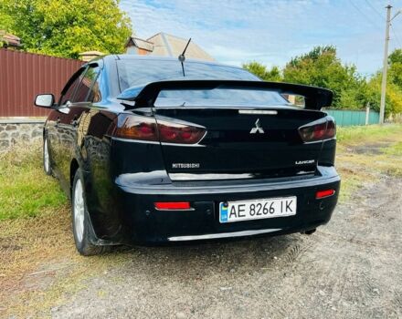 Чорний Міцубісі Lancer, об'ємом двигуна 2 л та пробігом 284 тис. км за 6200 $, фото 4 на Automoto.ua