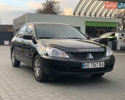 Черный Мицубиси Лансер, объемом двигателя 1.58 л и пробегом 237 тыс. км за 3850 $, фото 6 на Automoto.ua