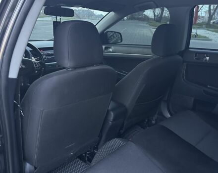 Черный Мицубиси Лансер, объемом двигателя 2 л и пробегом 242 тыс. км за 6200 $, фото 15 на Automoto.ua