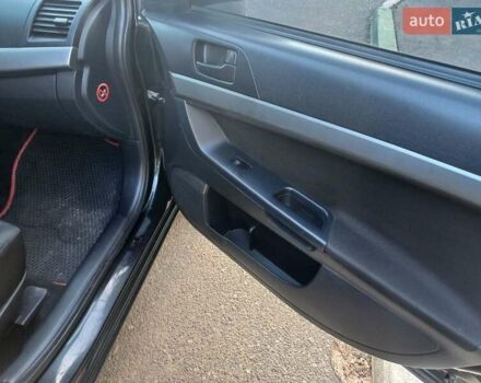 Чорний Міцубісі Lancer, об'ємом двигуна 1.5 л та пробігом 242 тис. км за 5550 $, фото 50 на Automoto.ua