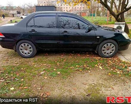 Чорний Міцубісі Lancer, об'ємом двигуна 1.6 л та пробігом 227 тис. км за 4100 $, фото 7 на Automoto.ua