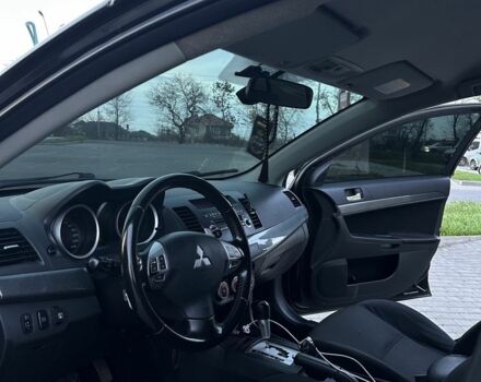 Черный Мицубиси Лансер, объемом двигателя 2 л и пробегом 242 тыс. км за 6200 $, фото 13 на Automoto.ua