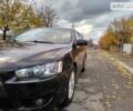 Чорний Міцубісі Lancer, об'ємом двигуна 2 л та пробігом 170 тис. км за 7600 $, фото 1 на Automoto.ua