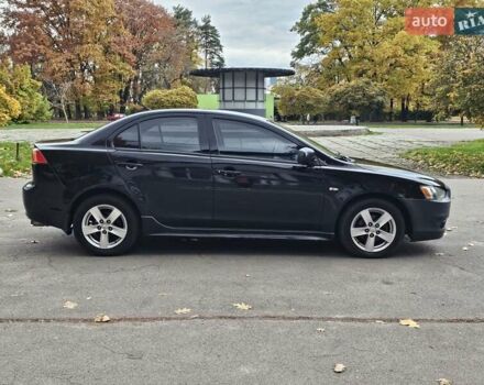 Міцубісі Lancer 2007 у Києві на Automoto.ua Чорний Міцубісі Lancer, об'ємом двигуна 2 л та пробігом 115 тис. км за 5000 $, фото 9 на Automoto.ua