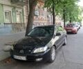 Черный Мицубиси Лансер, объемом двигателя 1.6 л и пробегом 345 тыс. км за 4199 $, фото 1 на Automoto.ua
