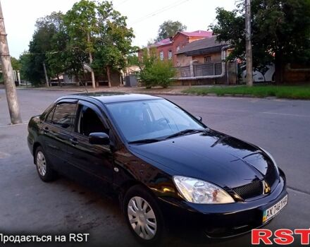 Черный Мицубиси Лансер, объемом двигателя 1.6 л и пробегом 247 тыс. км за 4000 $, фото 6 на Automoto.ua