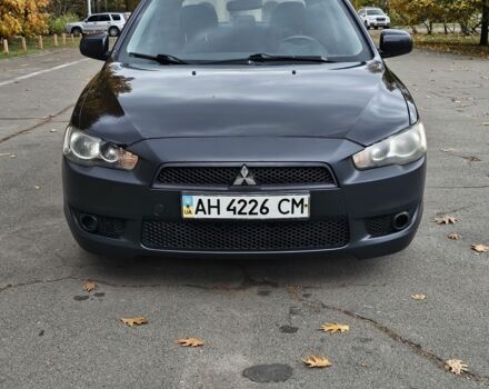 Черный Мицубиси Лансер, объемом двигателя 2 л и пробегом 115 тыс. км за 5000 $, фото 2 на Automoto.ua