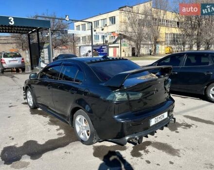 Чорний Міцубісі Lancer, об'ємом двигуна 2 л та пробігом 226 тис. км за 7200 $, фото 2 на Automoto.ua