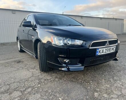 Черный Мицубиси Лансер, объемом двигателя 2 л и пробегом 170 тыс. км за 7900 $, фото 5 на Automoto.ua