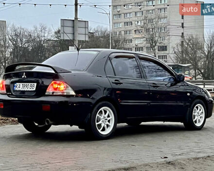 Чорний Міцубісі Lancer, об'ємом двигуна 1.6 л та пробігом 303 тис. км за 4350 $, фото 1 на Automoto.ua