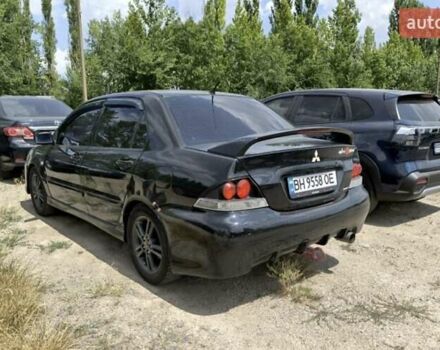 Чорний Міцубісі Lancer, об'ємом двигуна 2 л та пробігом 161 тис. км за 4300 $, фото 3 на Automoto.ua